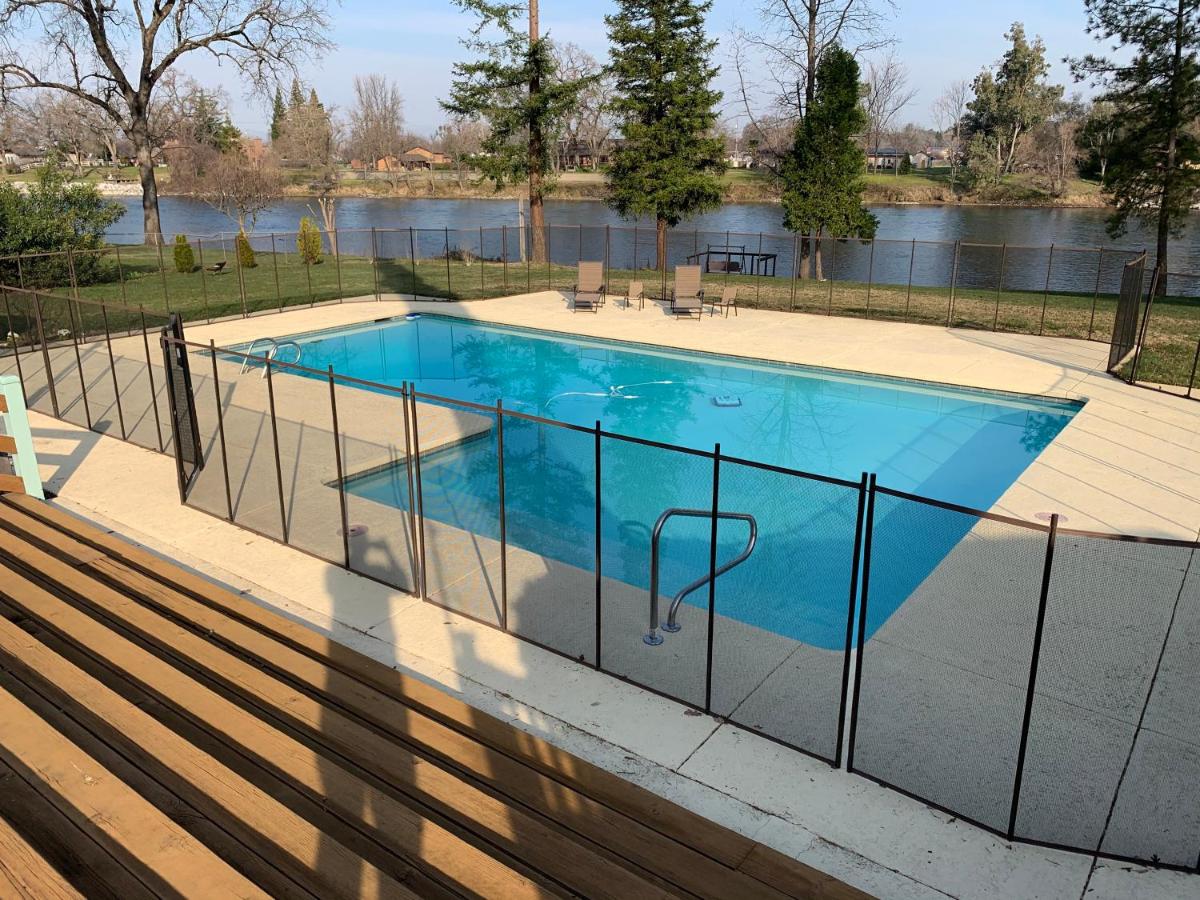 | Luxury Riverside Estate - 3BR Home or 1BR Cottage or BOTH - Sleeps 14 - Swim, fish, relax, refresh