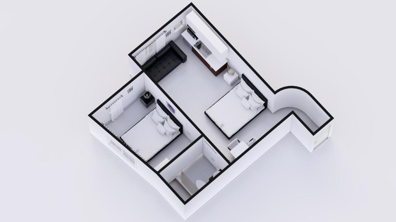 Deluxe Corner One-Bedroom Suite with Kitchen at Hotel Belleza