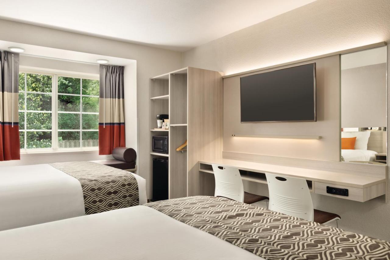 Queen Room with Two Queen Beds - Mobility Access/Non-Smoking at Microtel Inn & Suites by Wyndham Raleigh