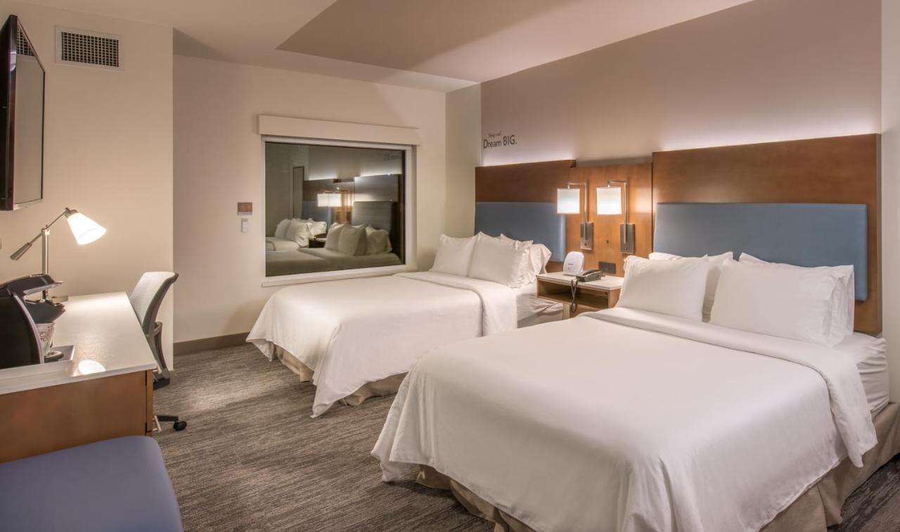 Queen Room with Two Queen Beds and Skyline View - Non-Smoking at EVEN Hotel Atlanta - Ballpark Area by IHG