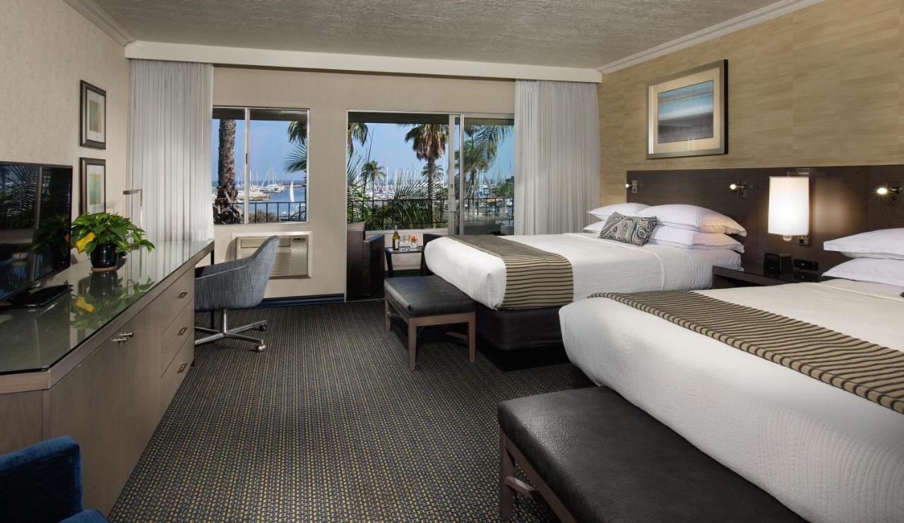 Queen Room with Two Queen Beds and Harbor View at West Beach Inn, a Coast Hotel