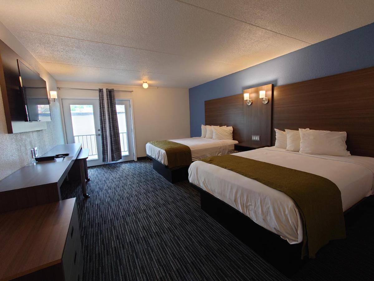 Two Queens Renovated With No Balcony at Reagan Resorts Inn