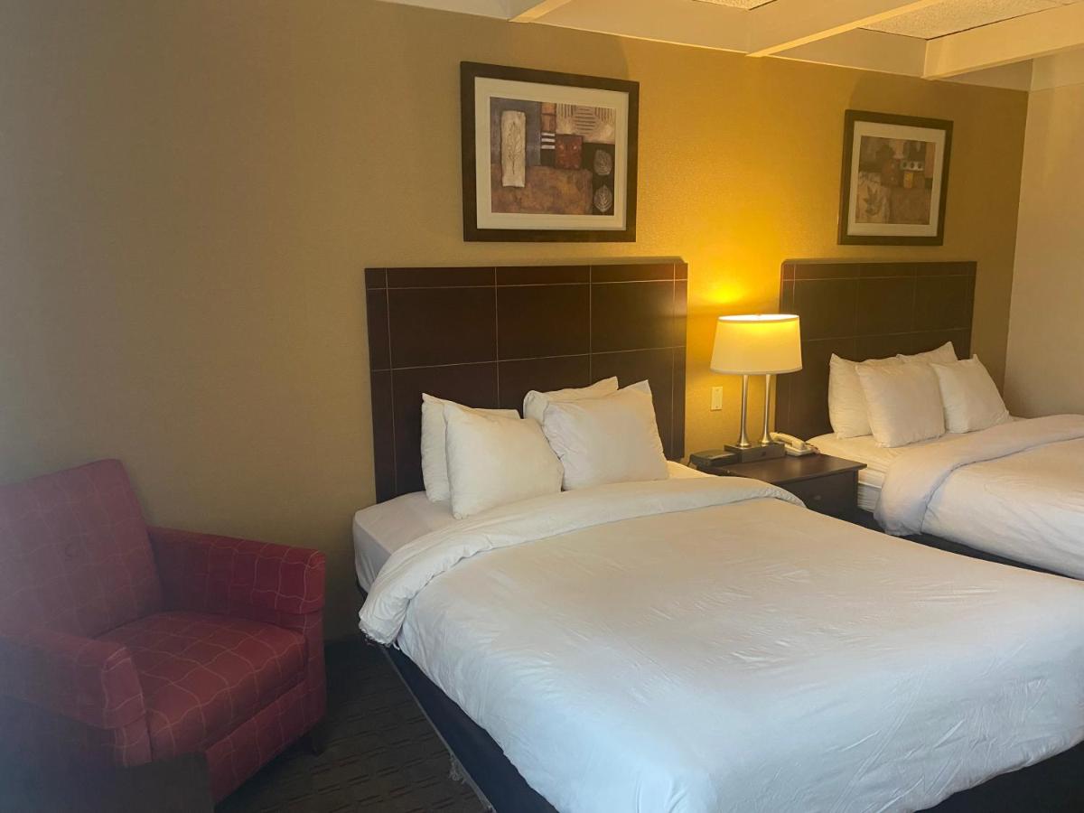 Efficiency Queen Room with Two Queen Beds - Non Smoking at Suburban Studios Buffalo Airport