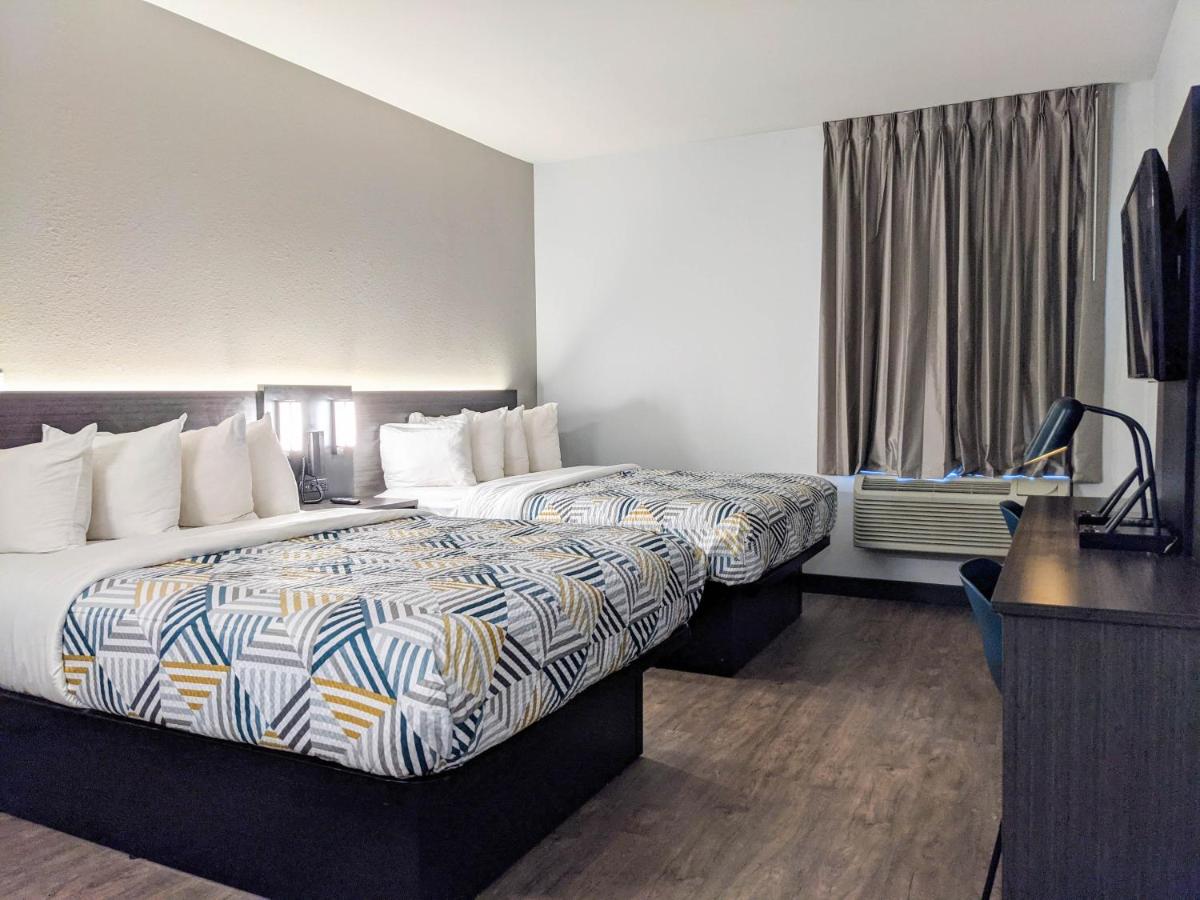 Queen Room with Two Queen Beds - Non-Smoking at Studio 6 Pensacola, FL - West I-10