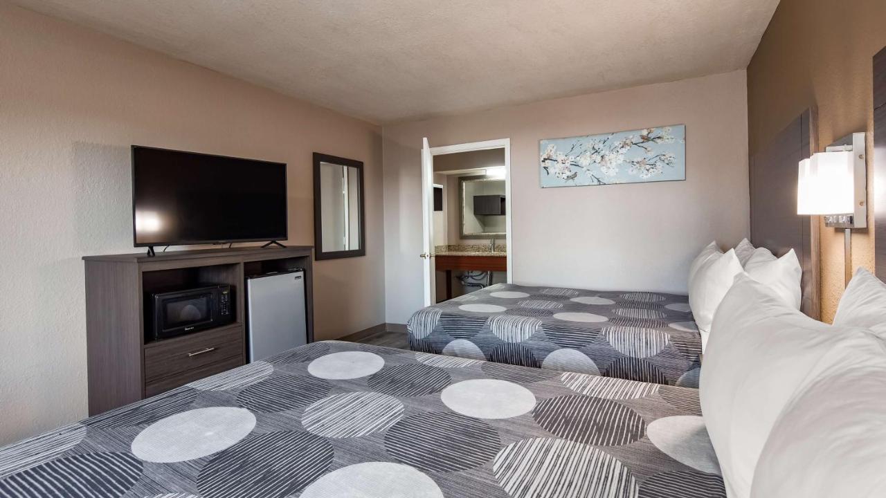 Queen Room with Two Queen Beds at SureStay Hotel by Best Western Olathe