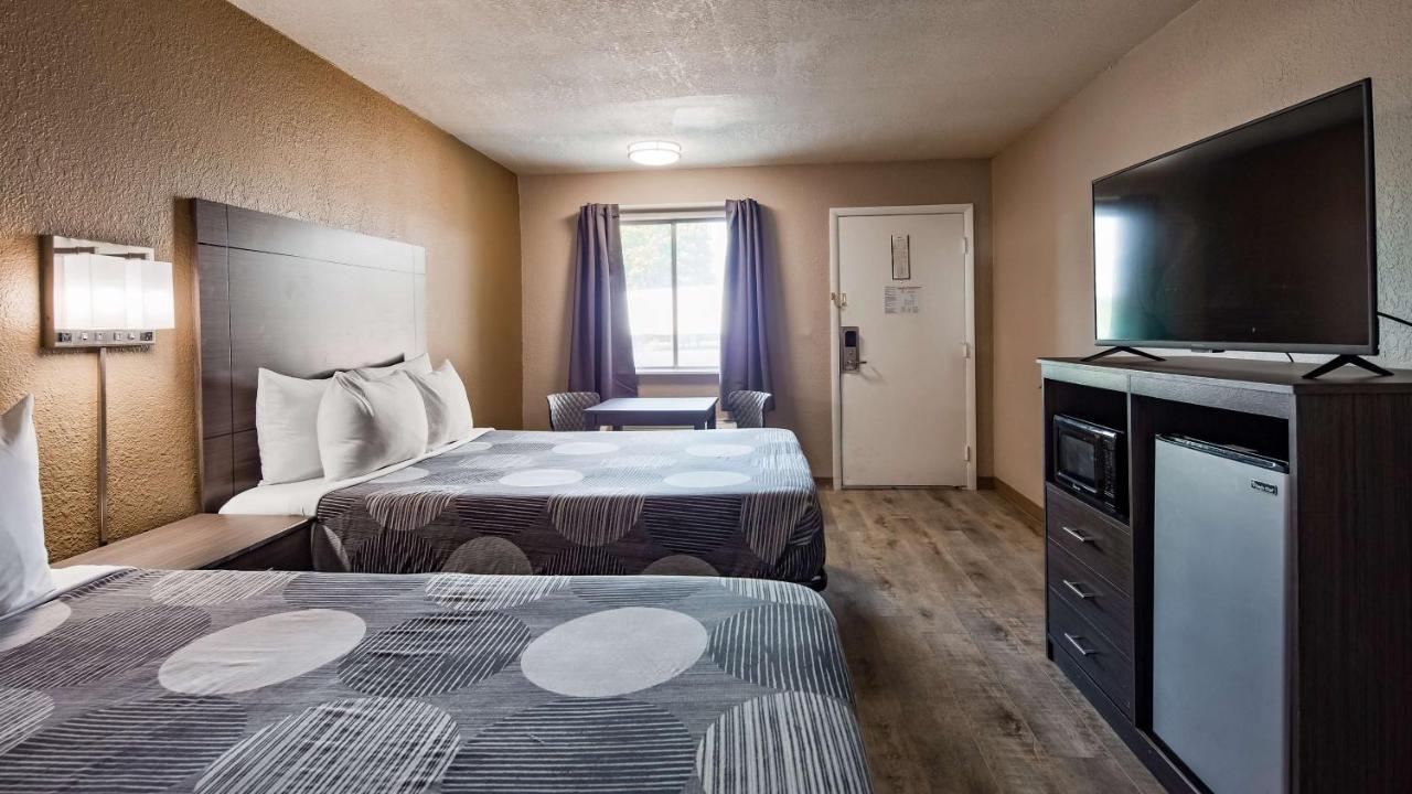 Queen Room with Two Queen Beds at SureStay Hotel by Best Western Olathe