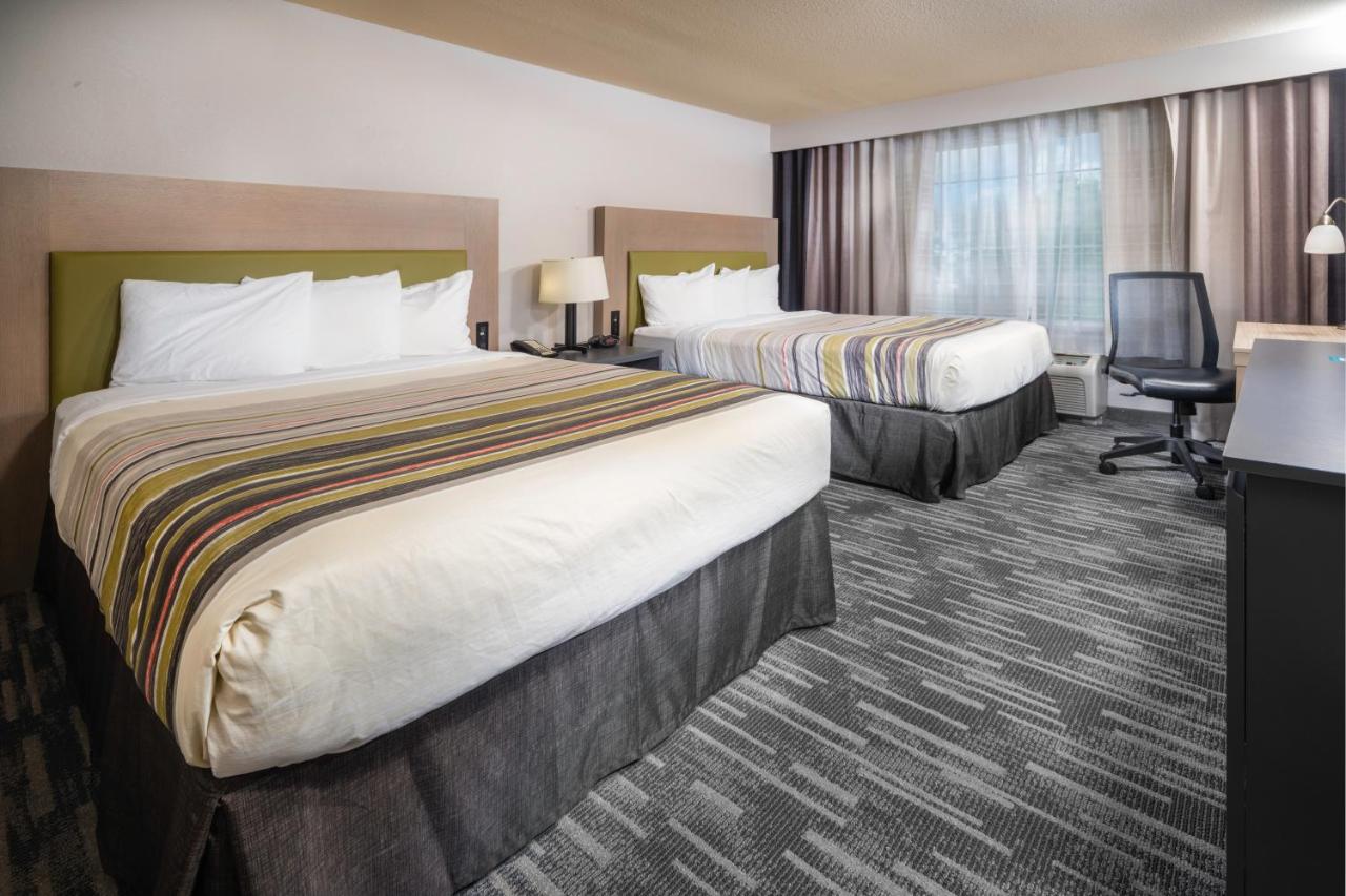 Queen Room with Two Queen Beds - Disability Access at Country Inn & Suites by Radisson, Rocky Mount, NC