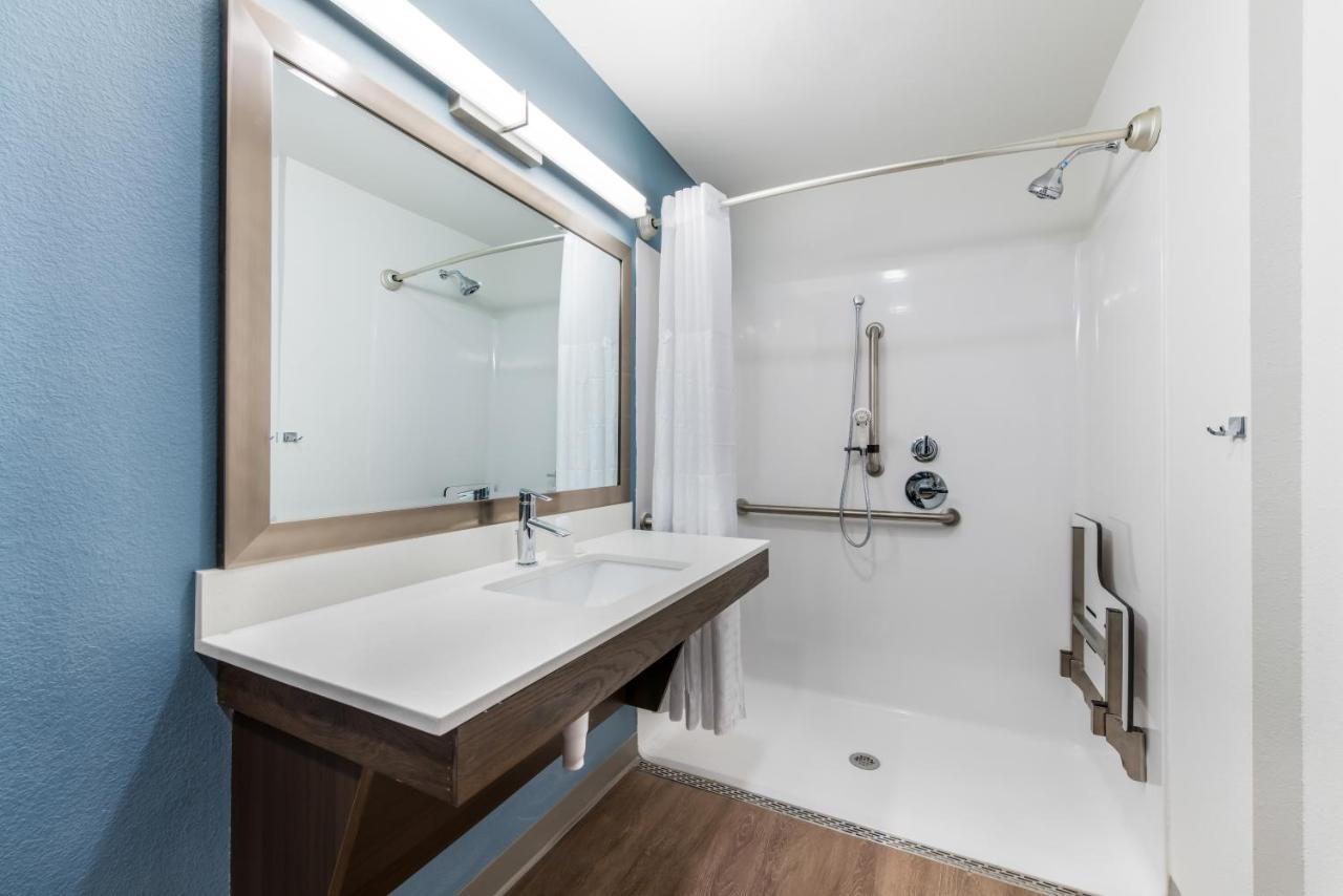 Queen Room with Roll-In Shower - Accessible/Non-Smoking at WoodSpring Suites Charlotte - University Research Park