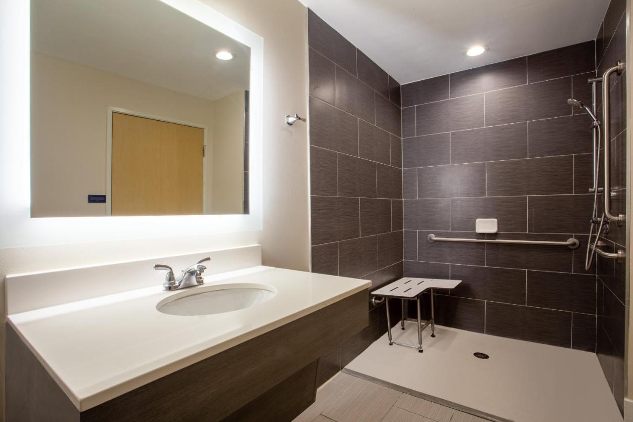 Queen Room with Hearing Accessible Roll In Shower at voco St. Augustine Historic Area by IHG