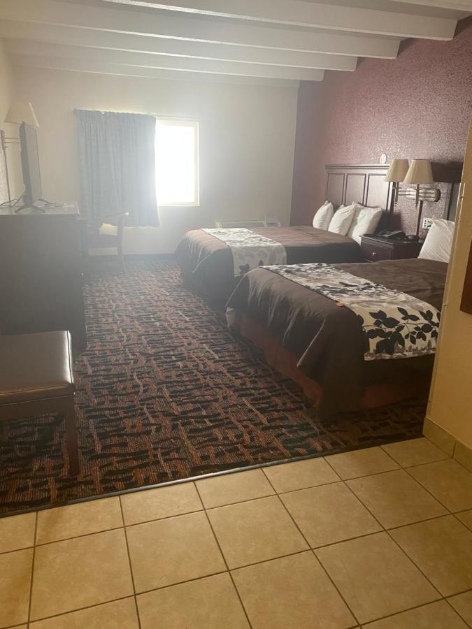 Queen Room with Two Queen Beds - Non-Smoking at Executive inn