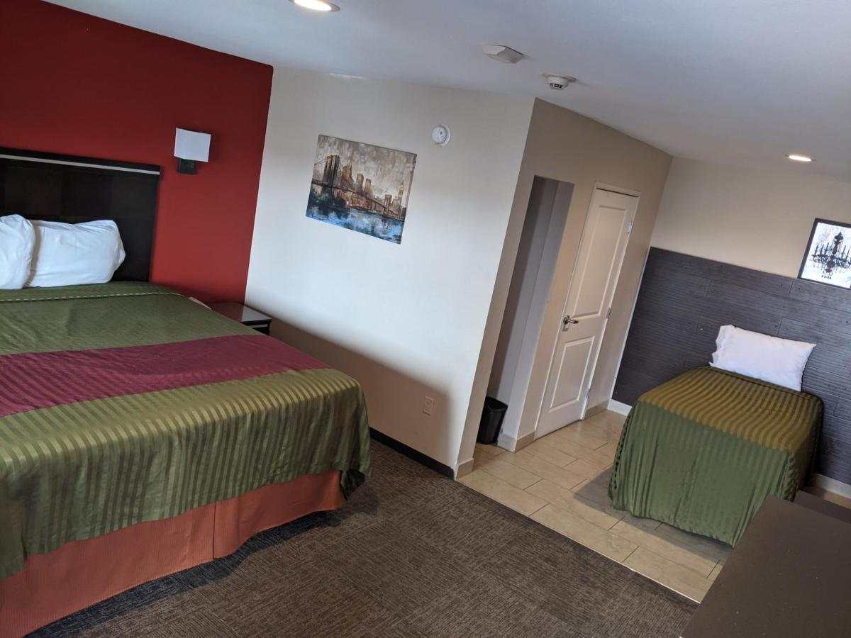 Deluxe Double Room (2 Adults + 1 Child) at Epic Hotel