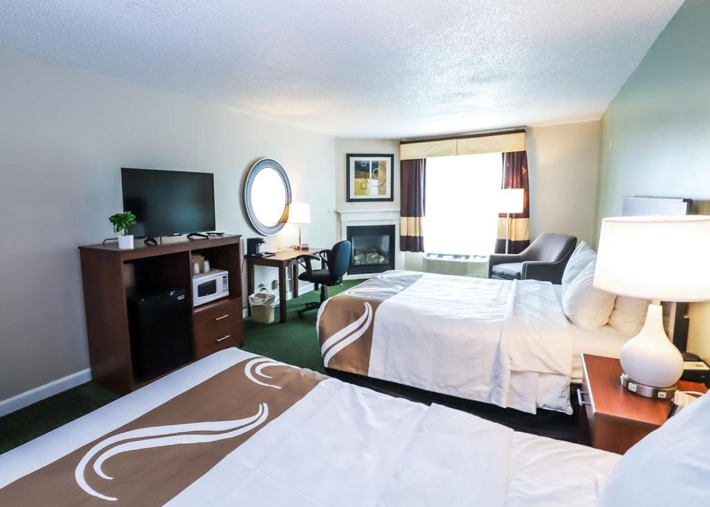 Standard Queen Room with Two Queen Beds with Fireplace - Non Smoking at Quality Inn & Suites