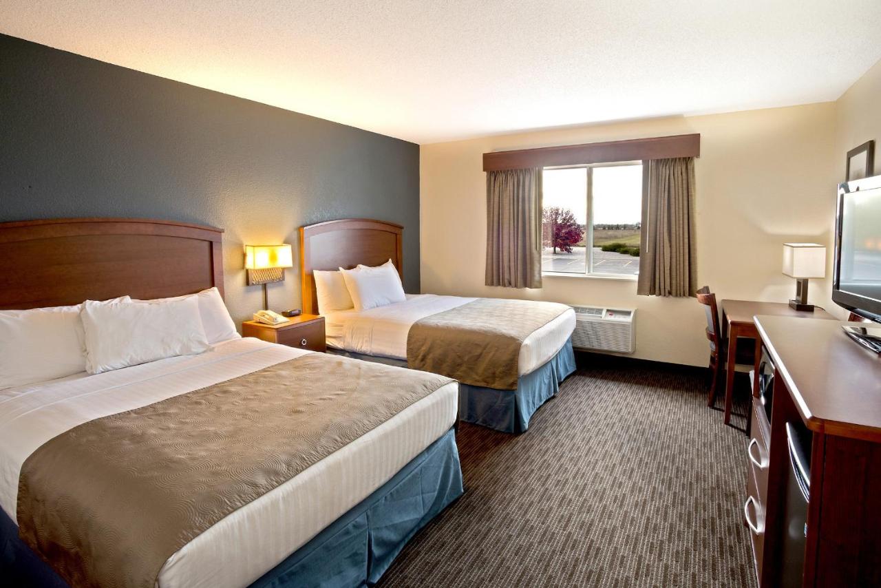 Queen Room with Two Queen Beds - Non-Smoking at AmericInn by Wyndham Bay City