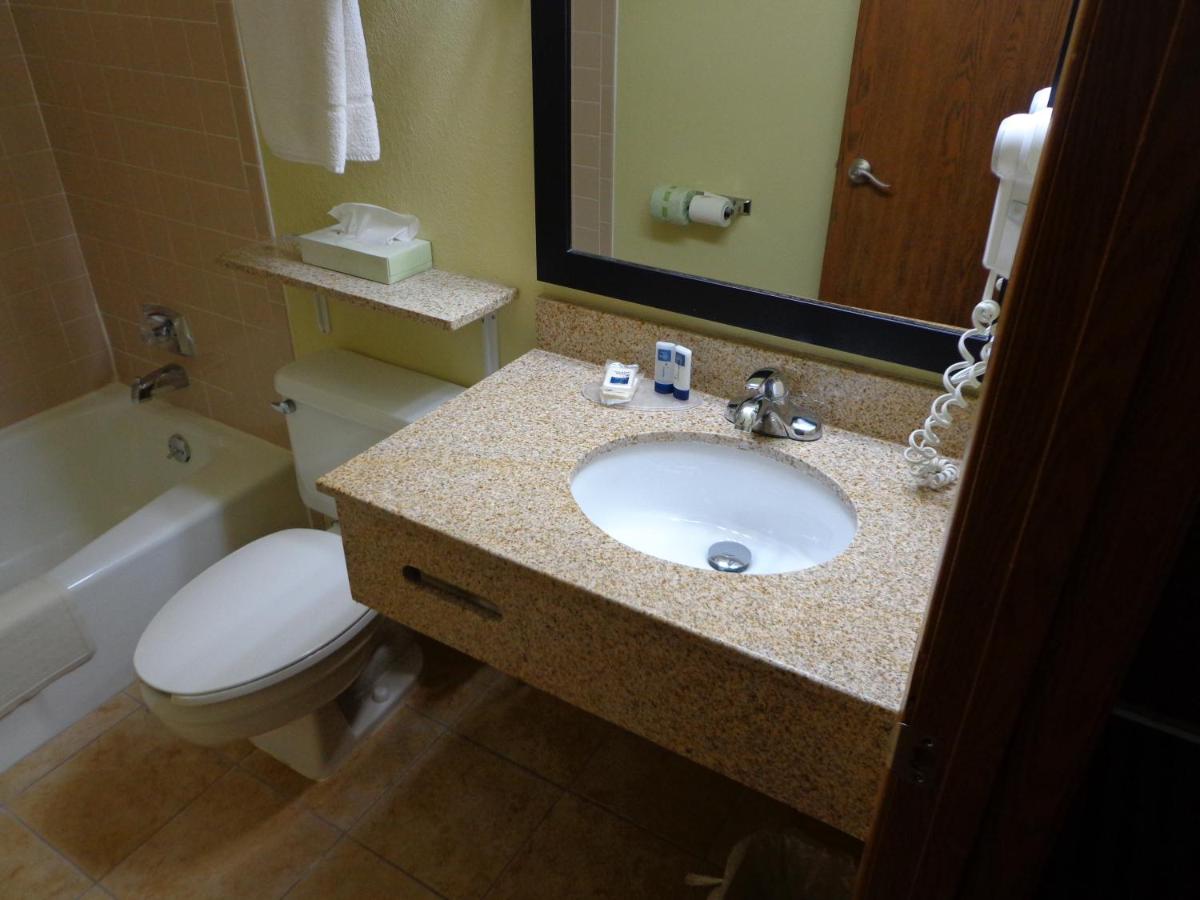 Queen Room with Two Queen Beds - Non-Smoking at AmericInn by Wyndham Council Bluffs