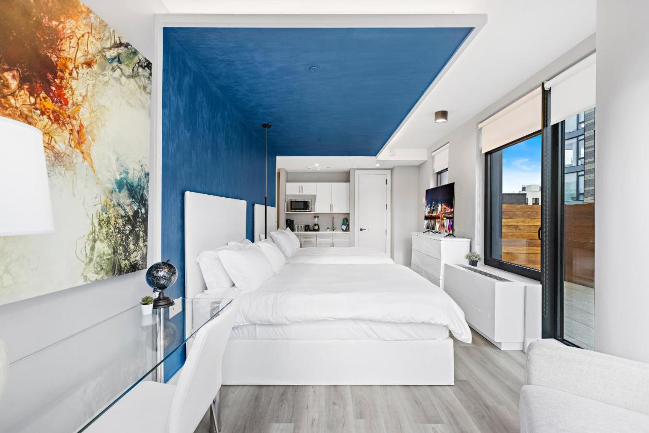 Deluxe Queen Suite with Two Queen Beds, Balcony, Non-Smoking at Global Luxury Suites at The Arches