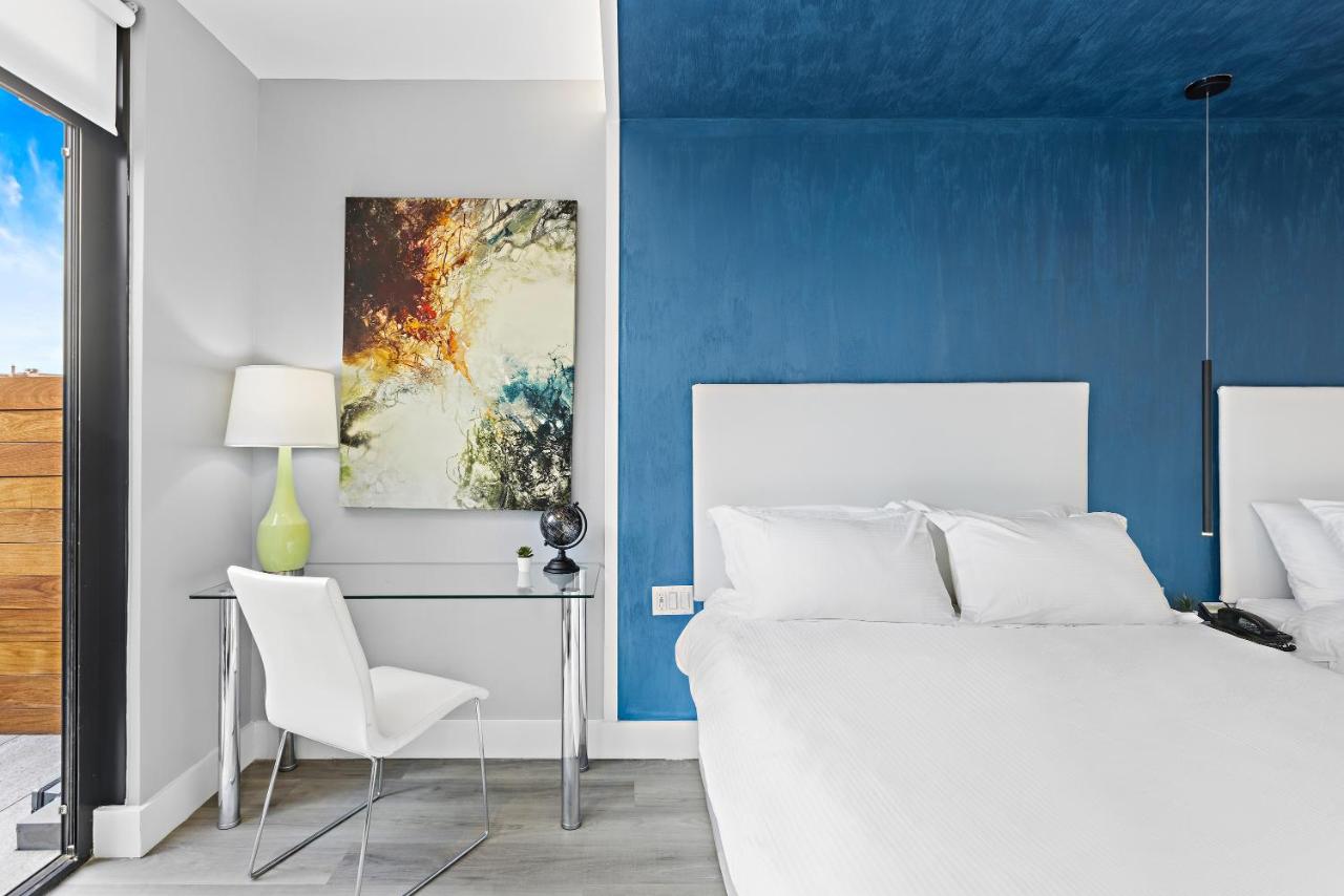 Deluxe Queen Suite with Two Queen Beds, Balcony, Non-Smoking at Global Luxury Suites at The Arches