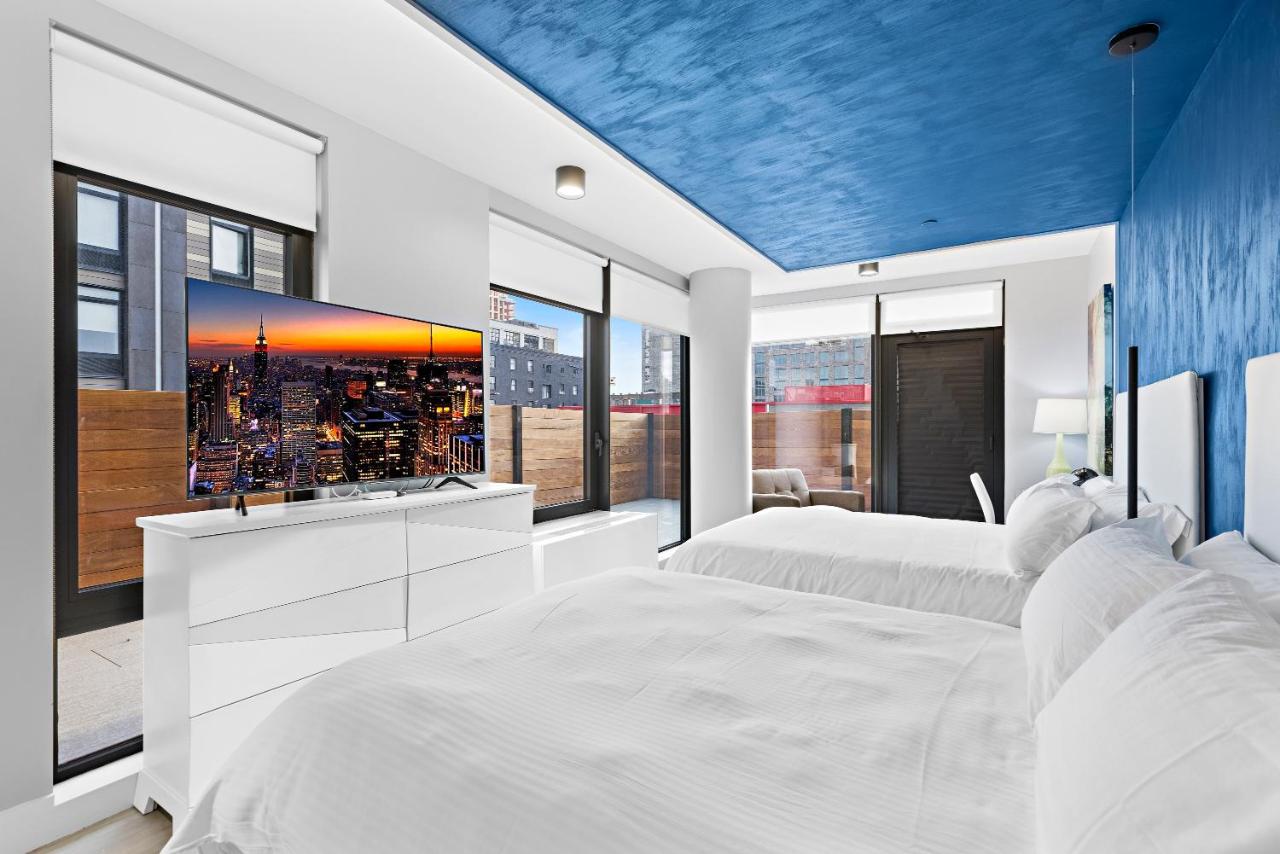 Deluxe Queen Suite with Two Queen Beds, Balcony, Non-Smoking at Global Luxury Suites at The Arches