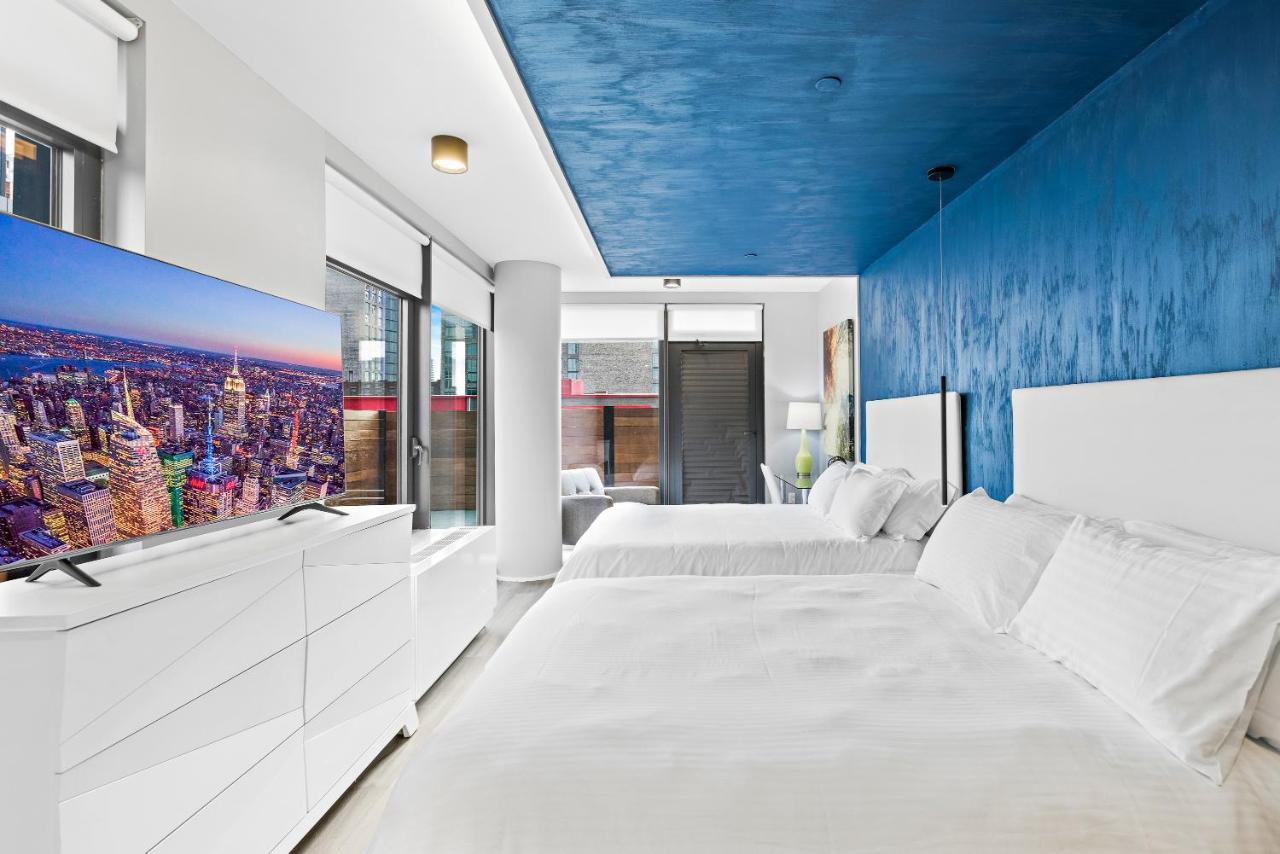 Deluxe Queen Suite with Two Queen Beds, Balcony, Non-Smoking at Global Luxury Suites at The Arches