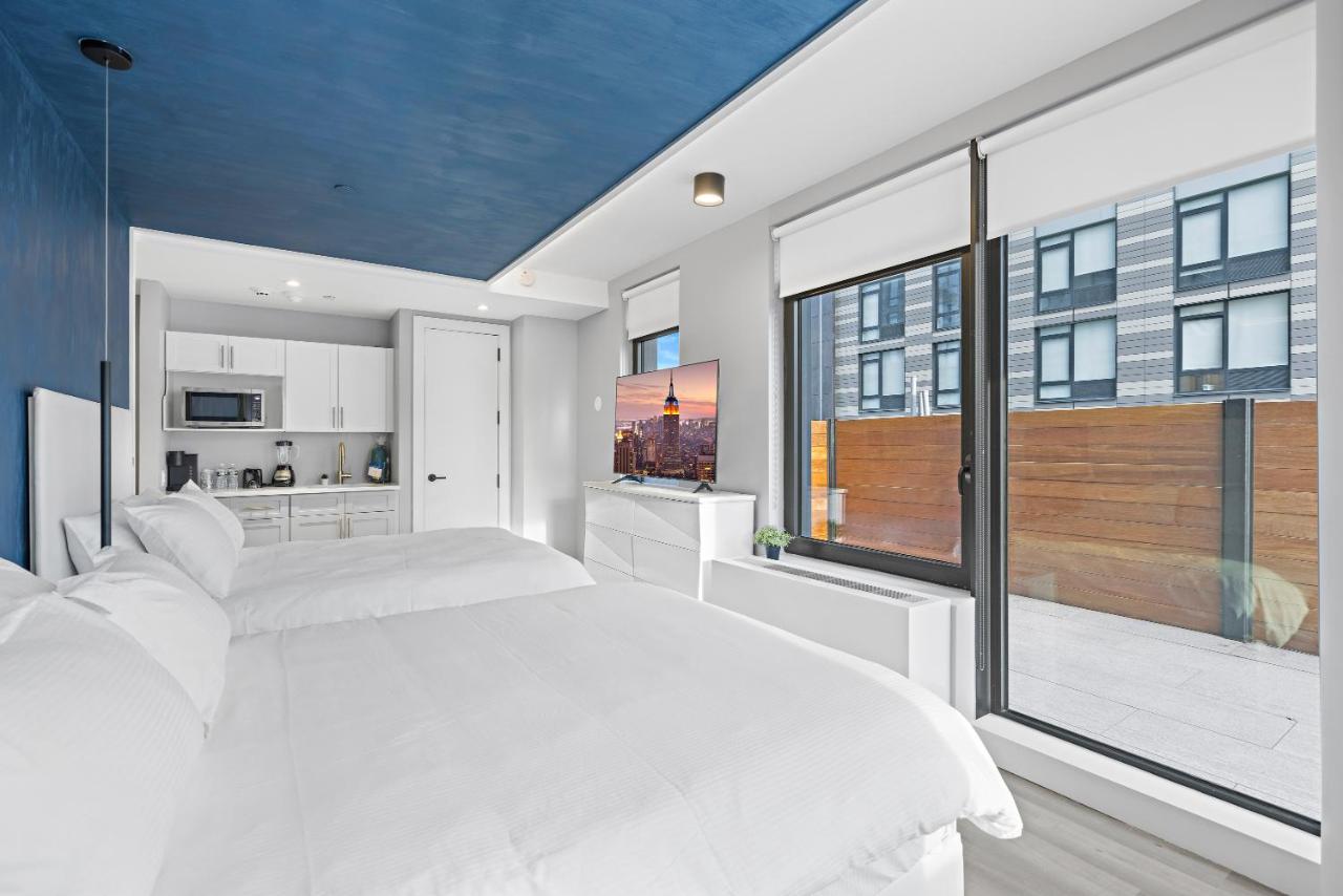 Deluxe Queen Suite with Two Queen Beds, Balcony, Non-Smoking at Global Luxury Suites at The Arches
