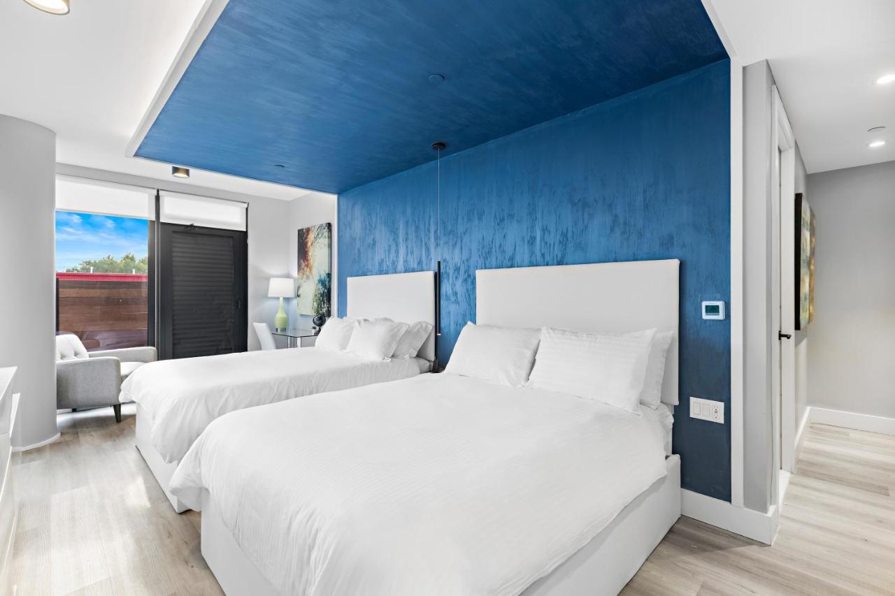 Deluxe Queen Suite with Two Queen Beds, Balcony, Non-Smoking at Global Luxury Suites at The Arches