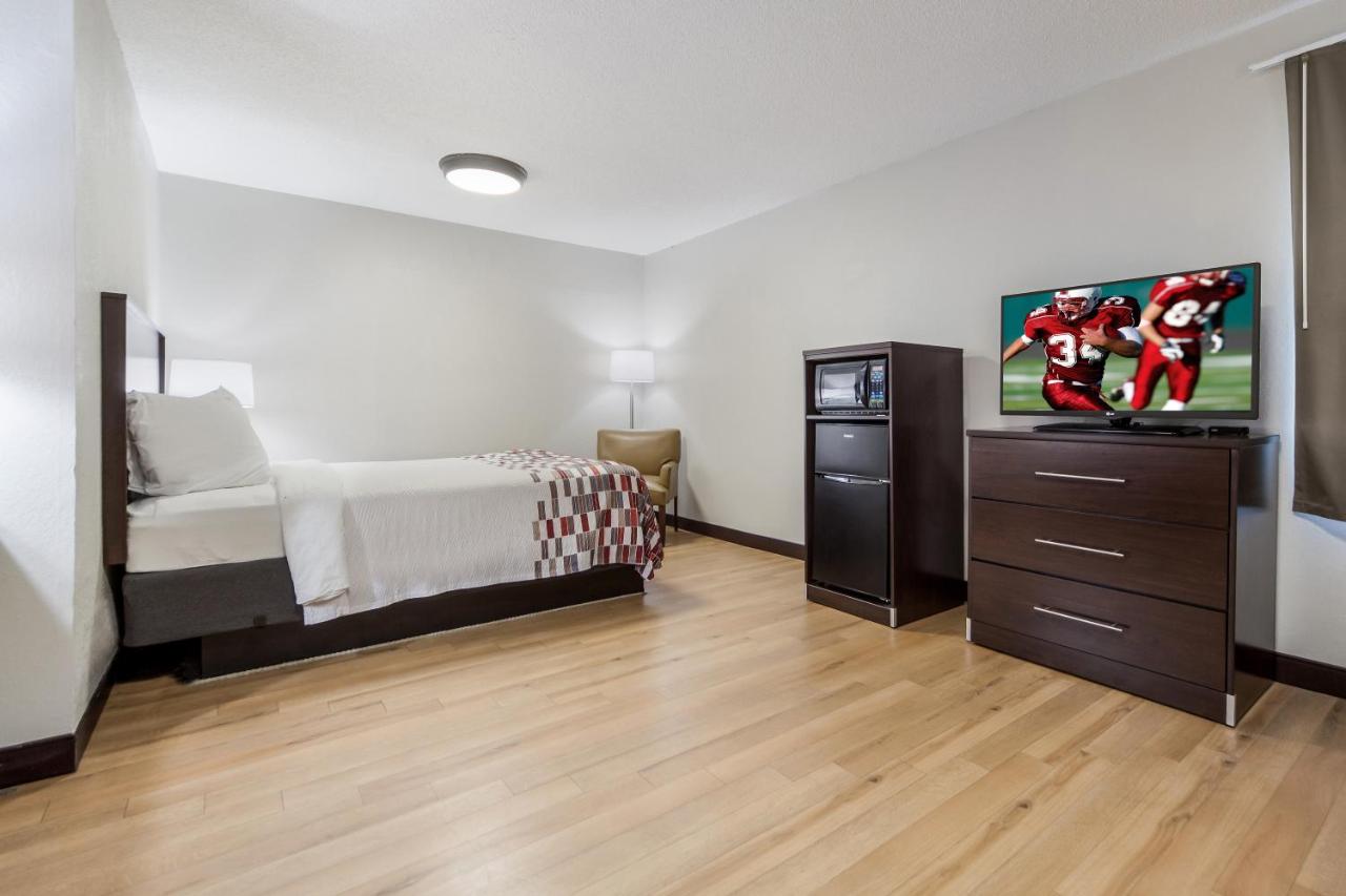 Deluxe Room with Three Queen Beds Smoke Free at Red Roof Inn PLUS+ Omaha - Council Bluffs