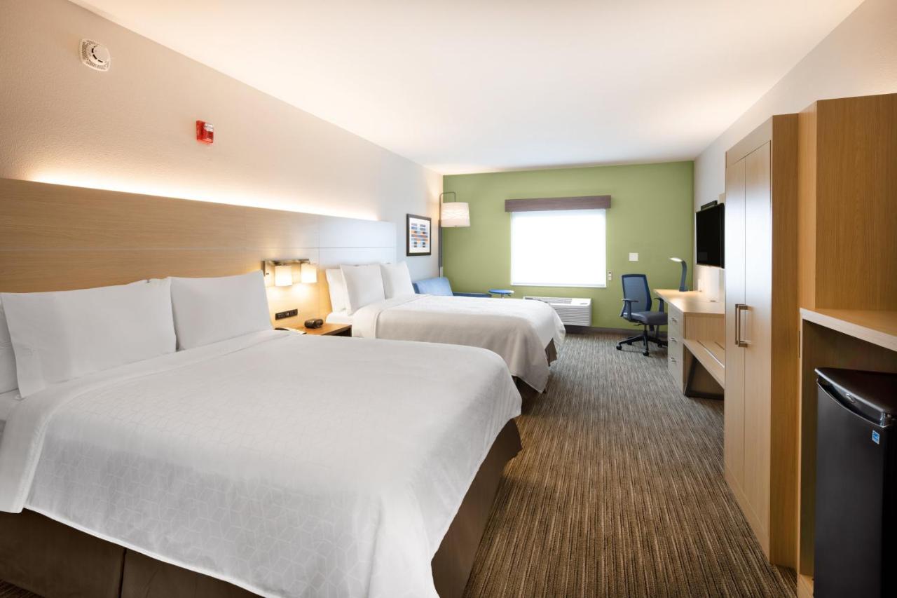 Queen Room with Two Queen Beds and Hearing Accessible Tub - Non-Smoking at Holiday Inn Express & Suites Ft Myers Beach-Sanibel Gateway by IHG