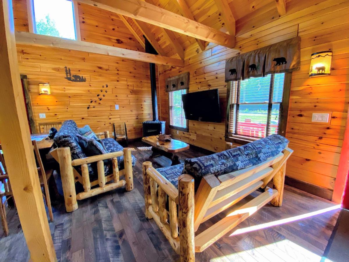 | BC Log cabin with private beach, river, fire pit, AC, wifi, onsite trails, ski slope views