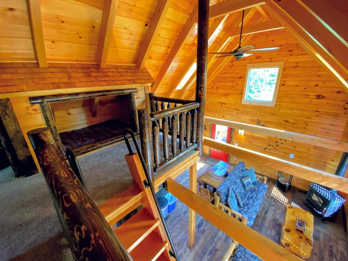 | BC Log cabin with private beach, river, fire pit, AC, wifi, onsite trails, ski slope views