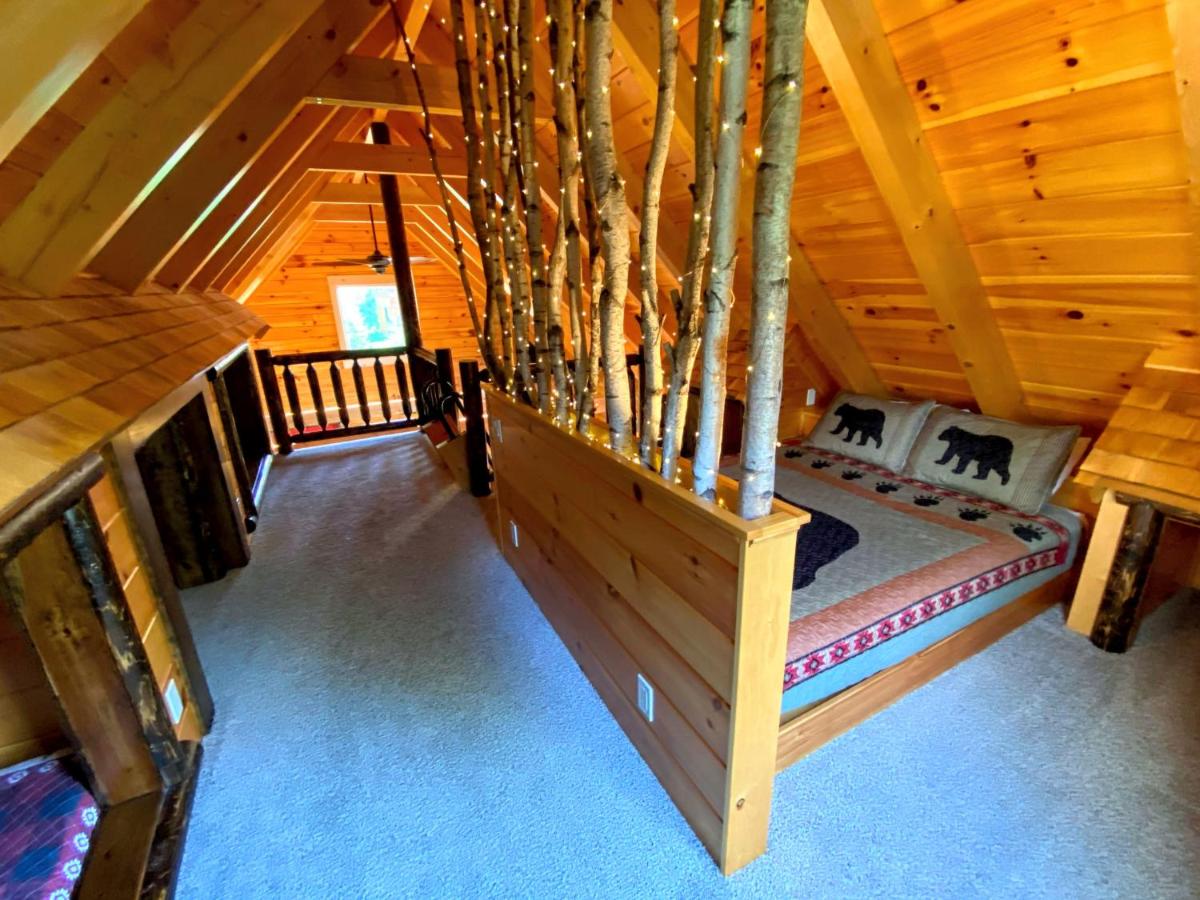 | BC Log cabin with private beach, river, fire pit, AC, wifi, onsite trails, ski slope views