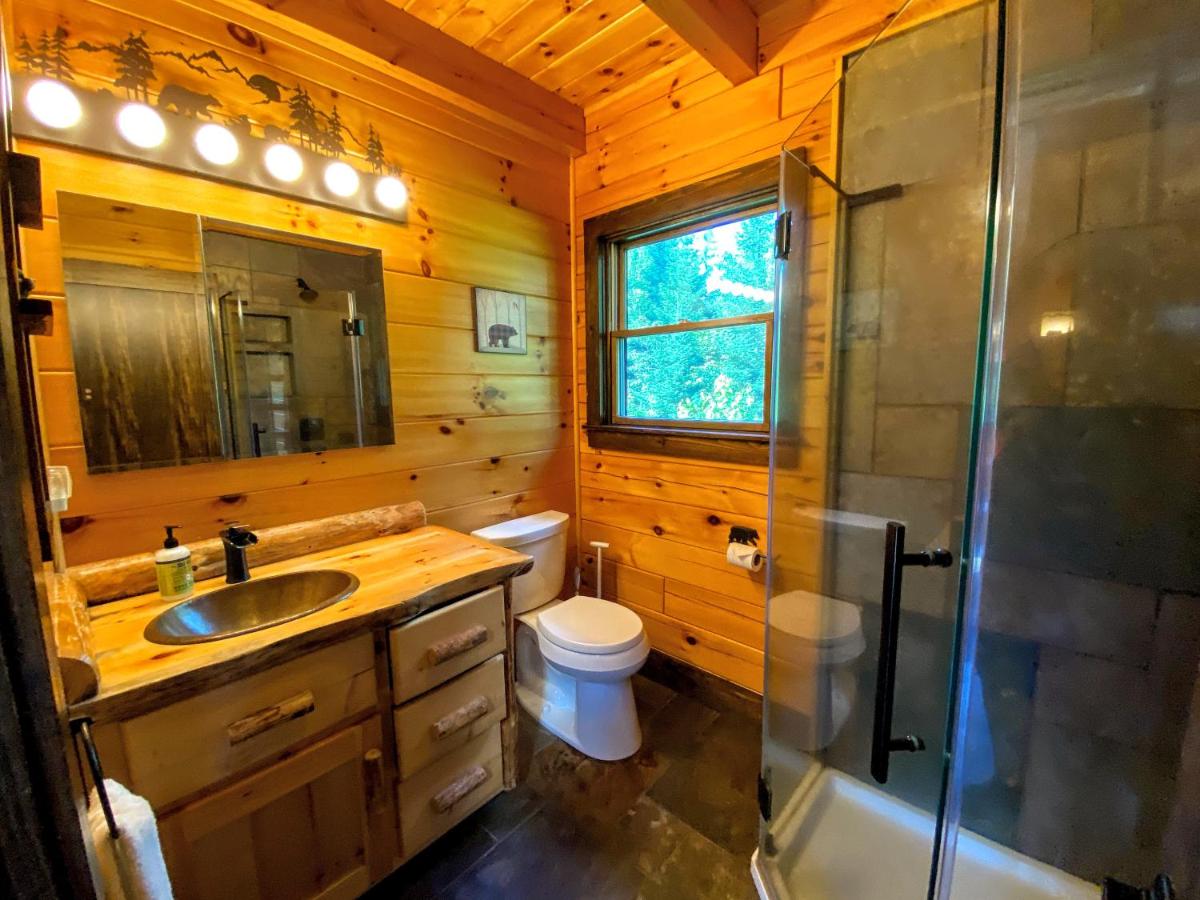 | BC Log cabin with private beach, river, fire pit, AC, wifi, onsite trails, ski slope views