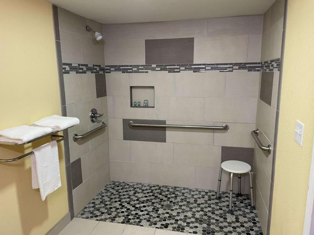 Double Room with Two Double Beds and Mobility Accessible Roll-In Shower at SureStay Plus Hotel by Best Western Odessa