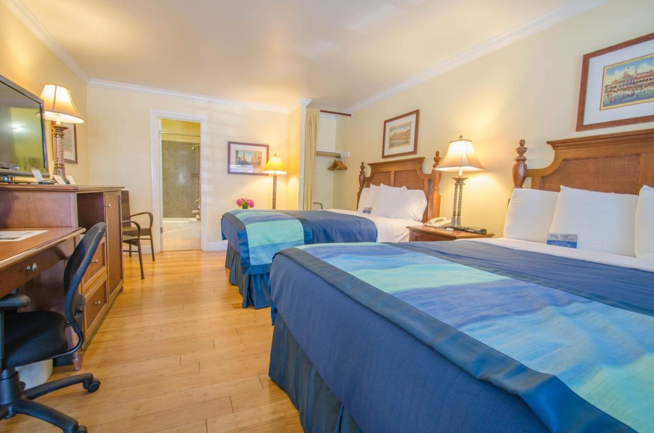 Queen Room with Two Queen Beds at Continental Inn