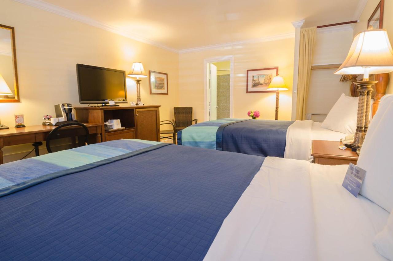 Queen Room with Two Queen Beds at Continental Inn