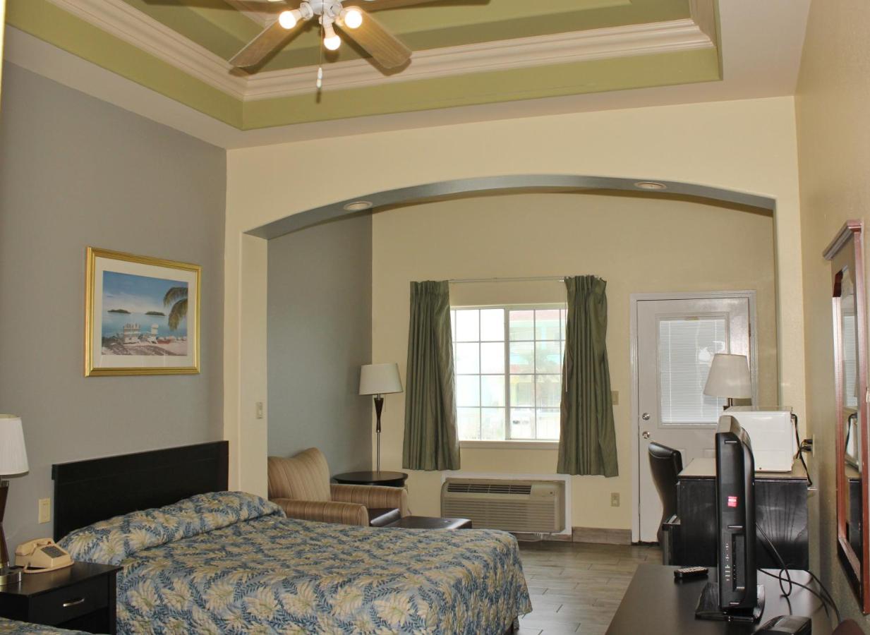 Queen Room with Pool View at Casa Bella Hotel and Suites