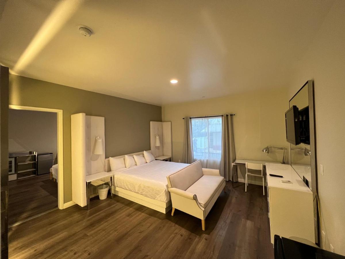 | ASPIRE INN & SUITES