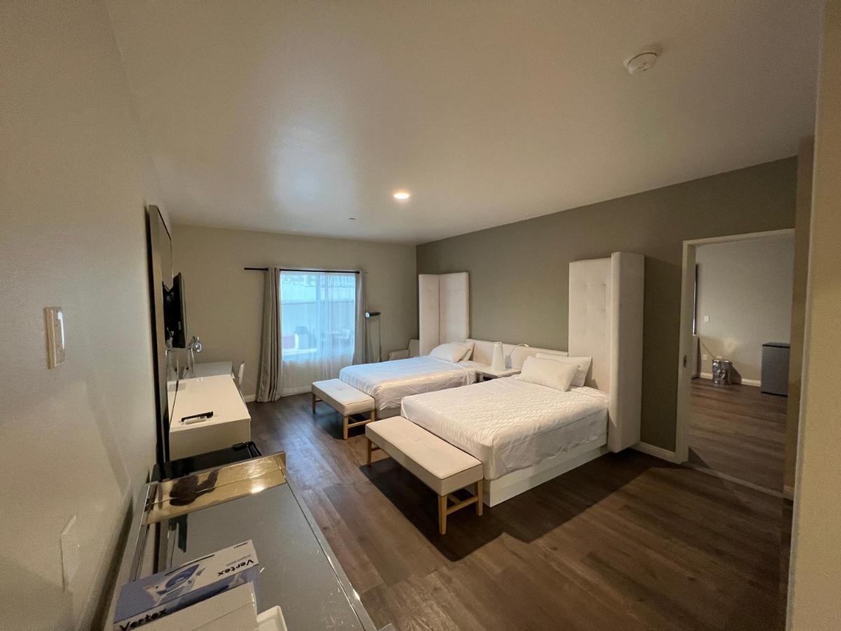 | ASPIRE INN & SUITES