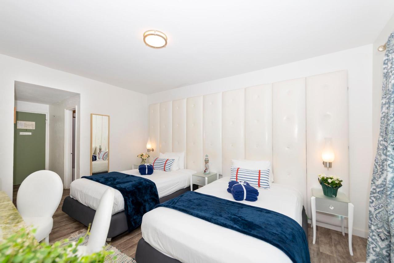 | Norman's Tavern Suites