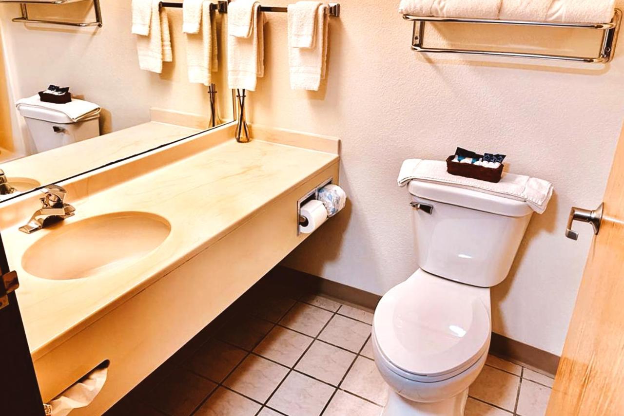 Deluxe Queen Room with Two Queen Beds Non-Smoking at Coratel Inn & Suites By Jasper Northfield