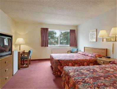 Deluxe Queen Room with Two Queen Beds - Disability Access - Non-Smoking at Sunset Inn & Suites