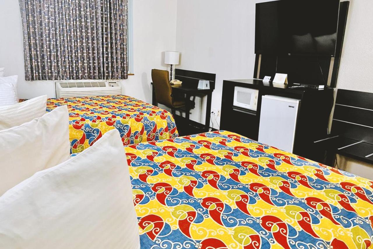 Queen Room with Two Queen Beds - Disability Access Non-Smoking at Coratel Inn & Suites By Jasper Northfield