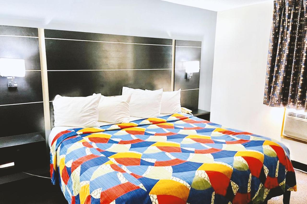 Deluxe King Room at Coratel Inn & Suites By Jasper Northfield