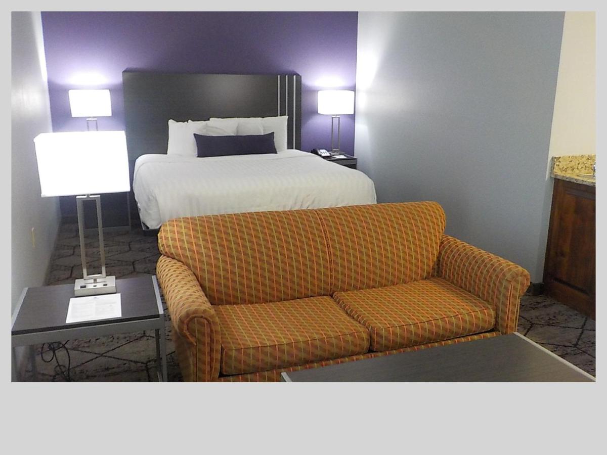 King Suite - Interior Corridor at SureStay Plus Hotel by Best Western Warner Robins AFB