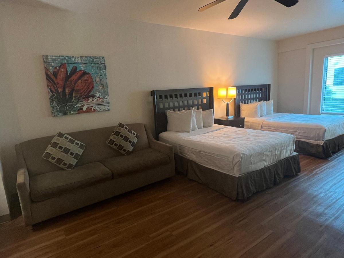 Deluxe Queen with Kitchenette and Sofa Bed at Sunchase Inn & Suites