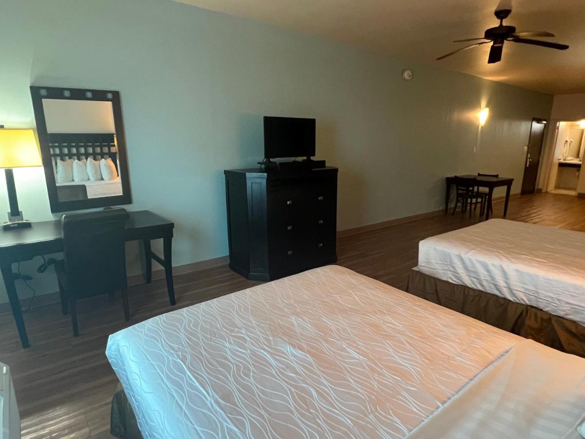 Deluxe Queen with Kitchenette and Sofa Bed at Sunchase Inn & Suites