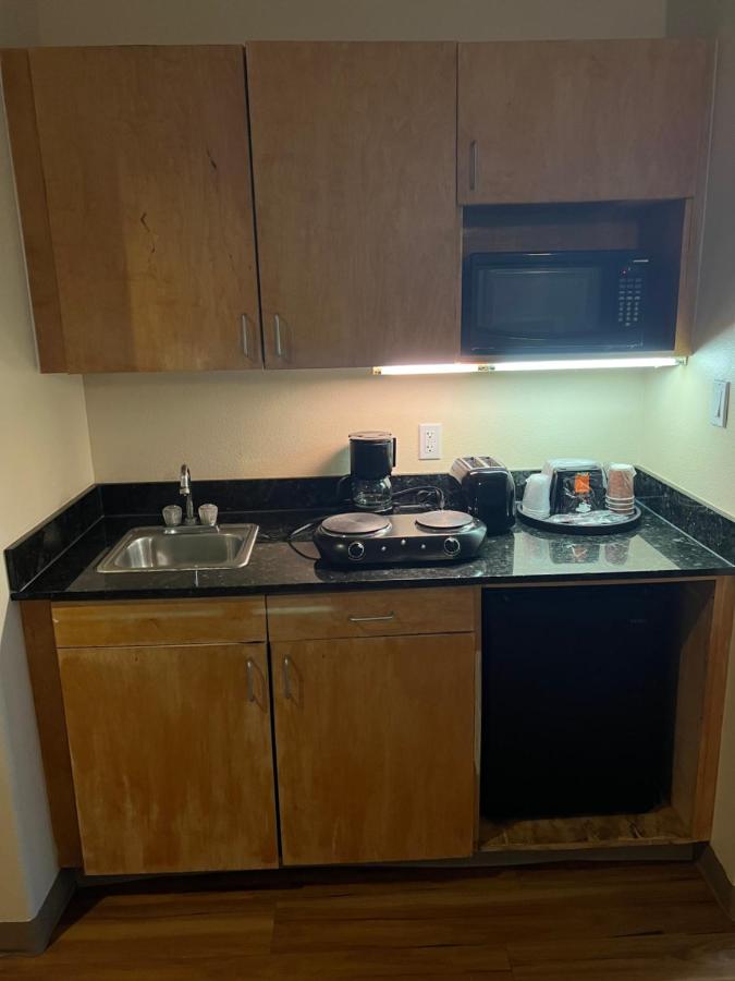 Deluxe Queen with Kitchenette and Sofa Bed at Sunchase Inn & Suites