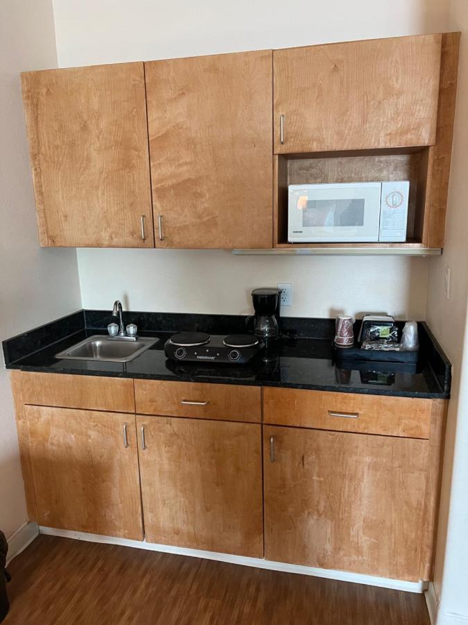 Deluxe Queen with Kitchenette and Sofa Bed at Sunchase Inn & Suites