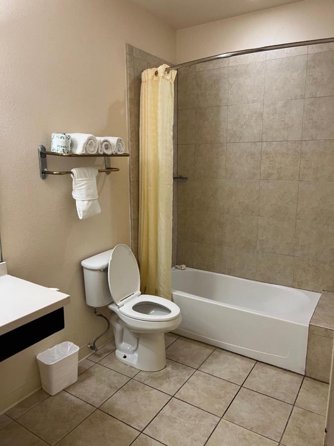 Deluxe Queen with Kitchenette and Sofa Bed at Sunchase Inn & Suites