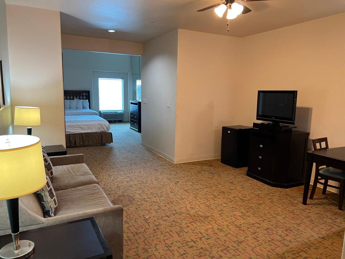 Deluxe Queen with Kitchenette and Sofa Bed at Sunchase Inn & Suites