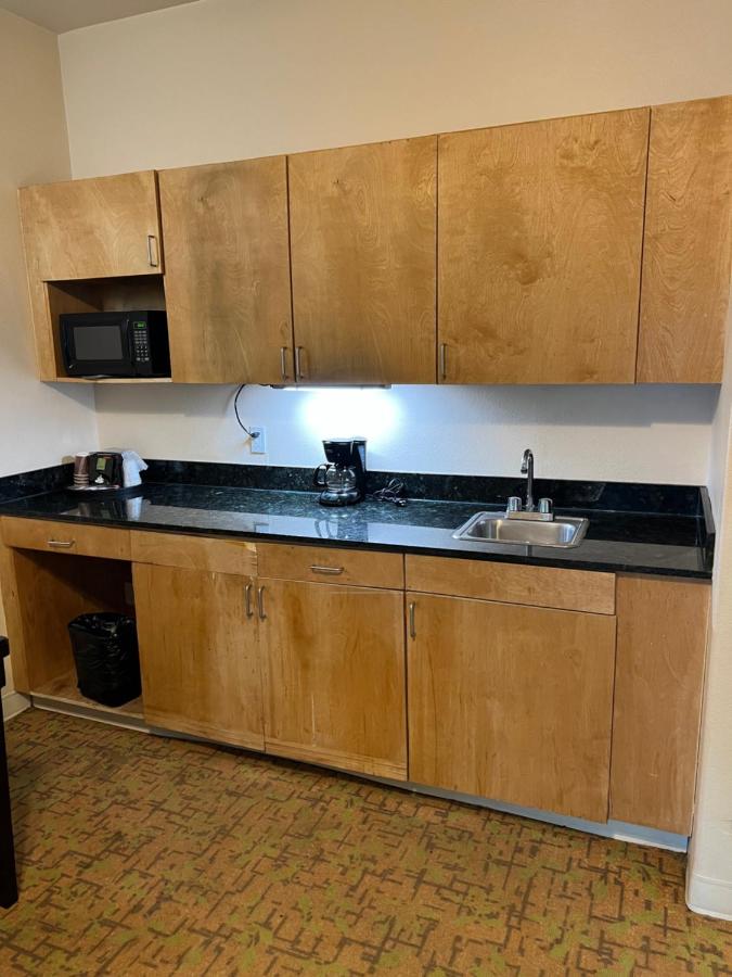 Deluxe Queen with Kitchenette and Sofa Bed at Sunchase Inn & Suites