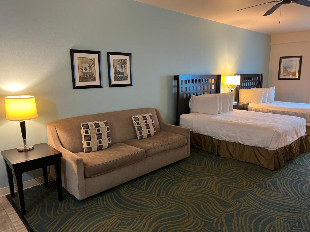 Queen Suite with Two Queen Beds and Sofa Bed at Sunchase Inn & Suites